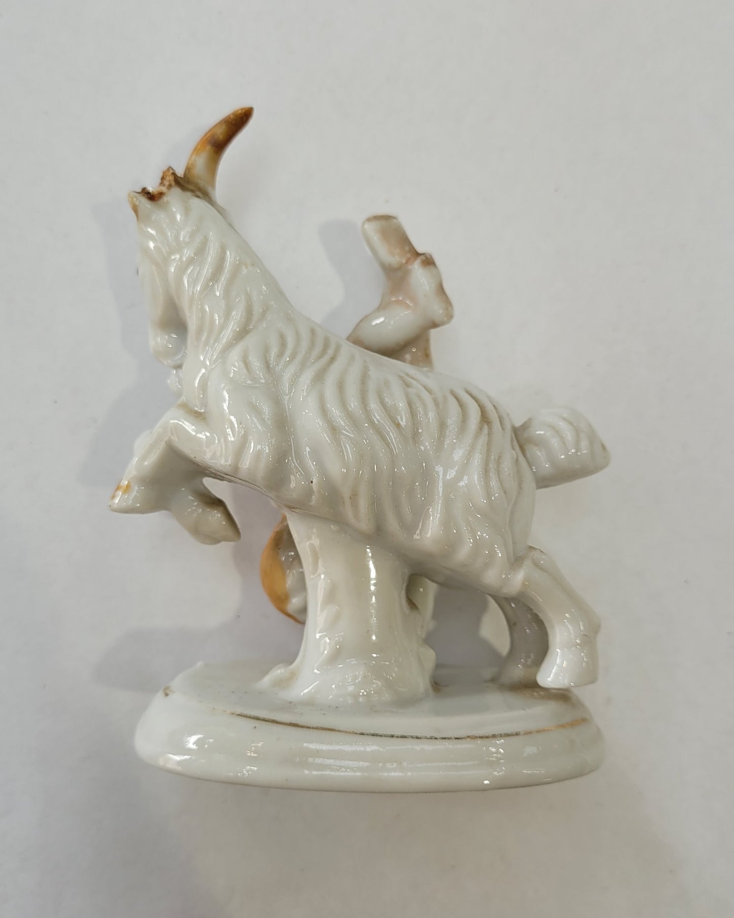Goat Throwing Child Statue